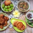 Mâm cơm với bánh pateso nhà làm