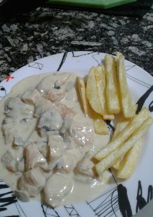 Una foto de Pollo al champignon