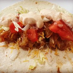 A picture of Shrimp Tacos with Homemade Shrimp Taco Sauce.