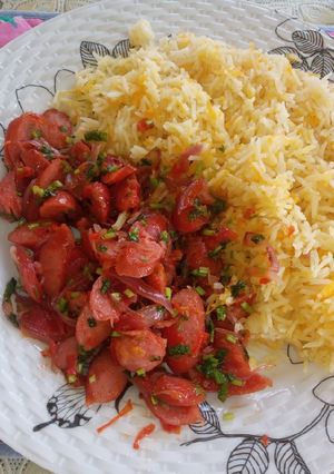 A picture of Carrot rice with mini bite stew.