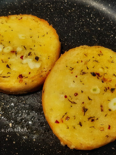 A picture of Toasted Bread with herbs and garlic butter.