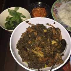 A picture of Bebek bumbu hitam khas madura.