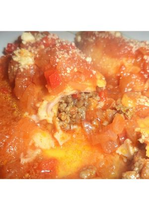 Una foto de Canelones de carne con salsa de tomate