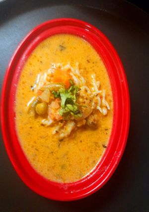A picture of Red lentil coconut soup.