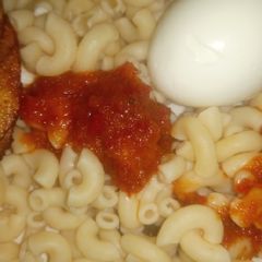 A picture of Simple Macaroni, boiled egg & sauce.