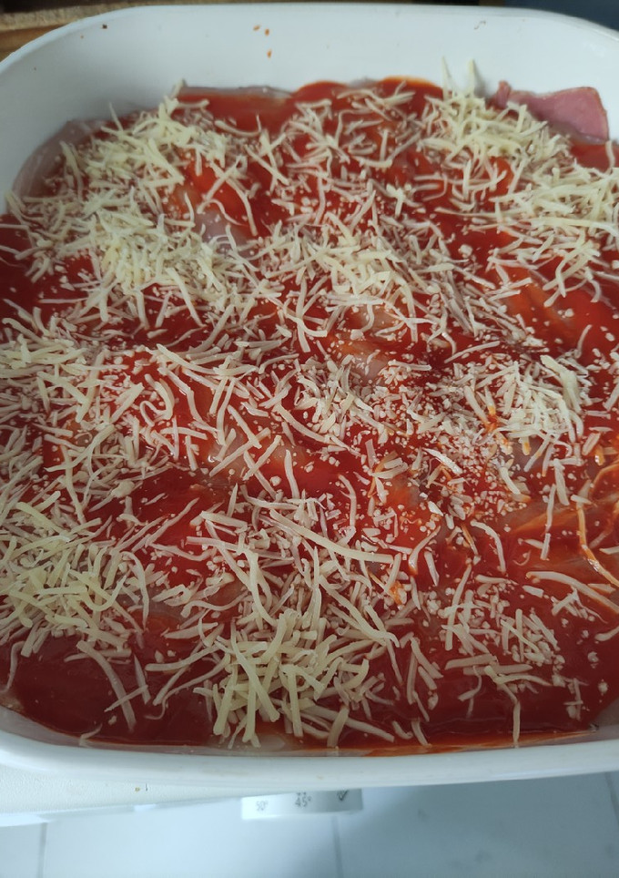 Una foto de Pollo con queso al horno