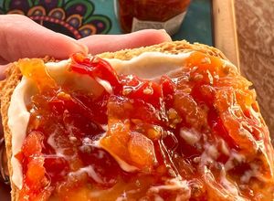 Una foto de Dulce de tomates y manzana