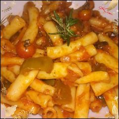 A picture of Tomato based pasta.