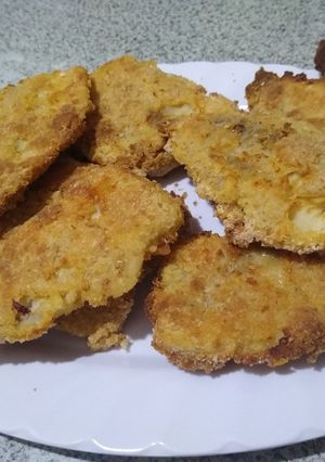 Una foto de Milanesa de merluza