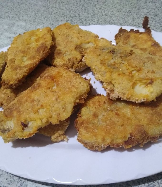 Una foto de Milanesa de merluza
