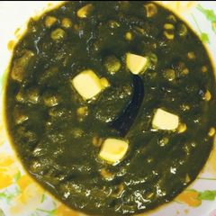 A picture of Corn peas in palak gravy.