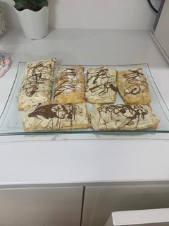 Una foto de Cañas / Napolitanas caseras de hojaldre rellenas (crema pastelera / crema pastelera de chocolate)
