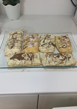 Una foto de Cañas / Napolitanas caseras de hojaldre rellenas (crema pastelera / crema pastelera de chocolate)