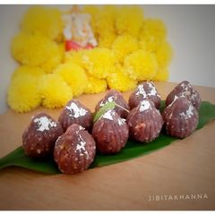 A picture of Red Cabbage Modak (Red Cabbage, Coconut and mixed nuts).