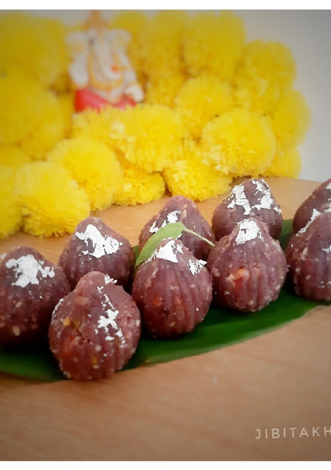A picture of Red Cabbage Modak (Red Cabbage, Coconut and mixed nuts).