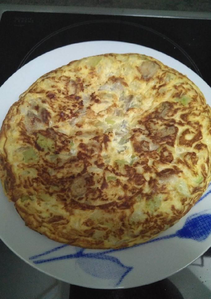 Una foto de Tortilla de Calabacín, Champiñones y Queso Feta