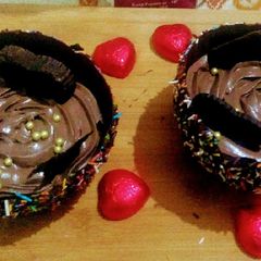 A picture of Chocolate mousse in chocolate ballons.