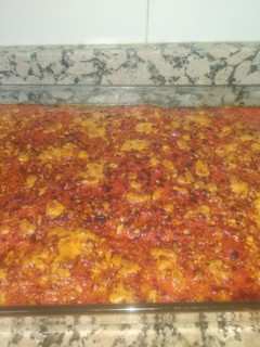 Una foto de Pastel de espinacas con jamón, queso y tomate