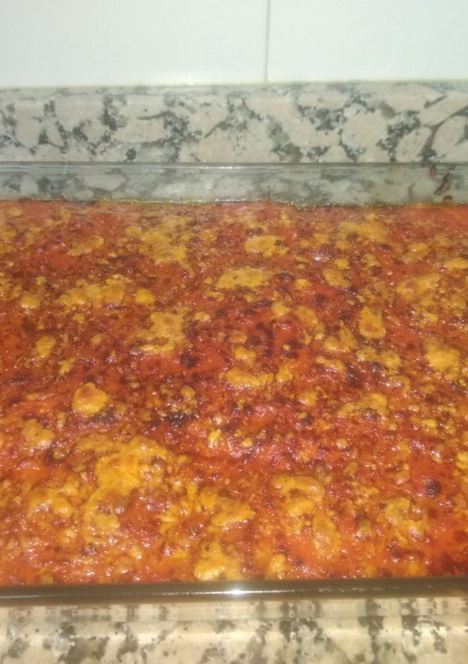 Una foto de Pastel de espinacas con jamón, queso y tomate
