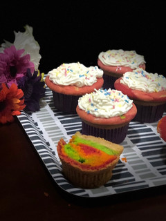 A picture of Multicolor cupcakes.