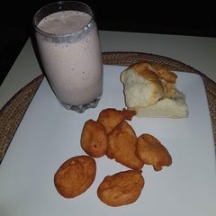 A picture of Akara, bread and tea.