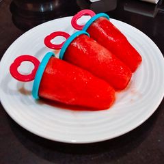 A picture of Watermelon Ice Popsicles.