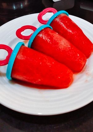 A picture of Watermelon Ice Popsicles.