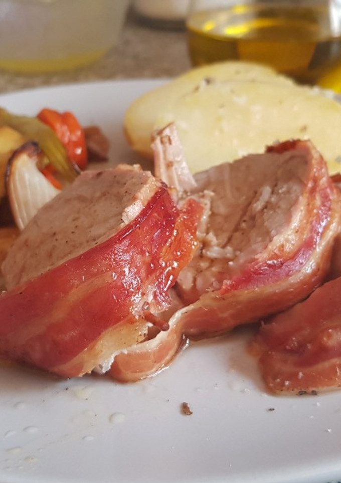Una foto de Solomillo al horno envuelto en Bacon