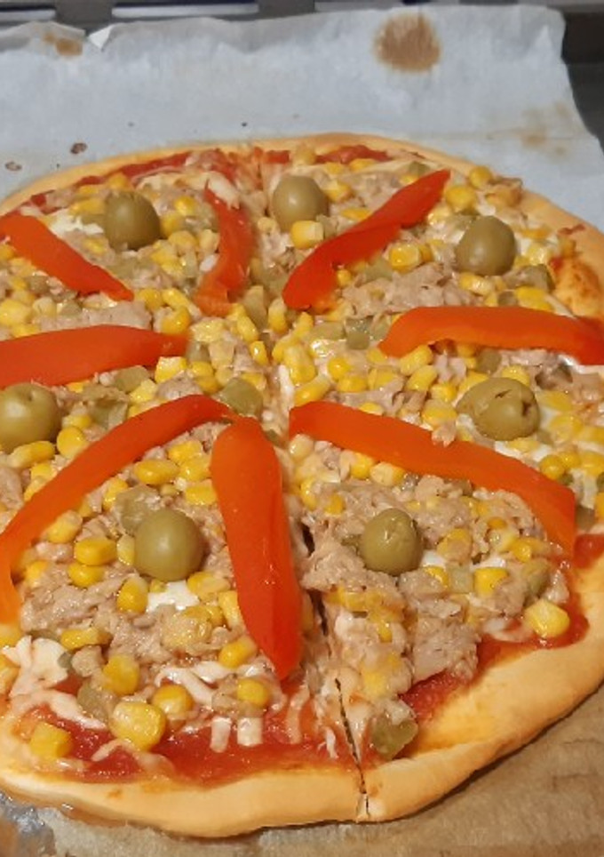 Una foto de Pizza de atún...y más