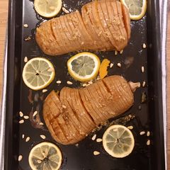 A picture of Hasslebacked Squash with Lemon and Maple Syrup.