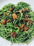 Agretti saltati con aglio fresco e pomodorini secchi