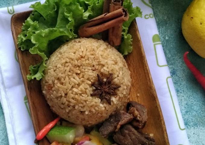 Ternyata begini loh! Bagaimana cara memasak Nasi Kebuli Daging Sapi (Rice Cooker) yang sesuai selera
