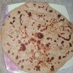 A picture of Steam chicken potato paratha.
