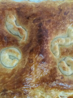 Una foto de Empanada de sobrasada, bacon y queso