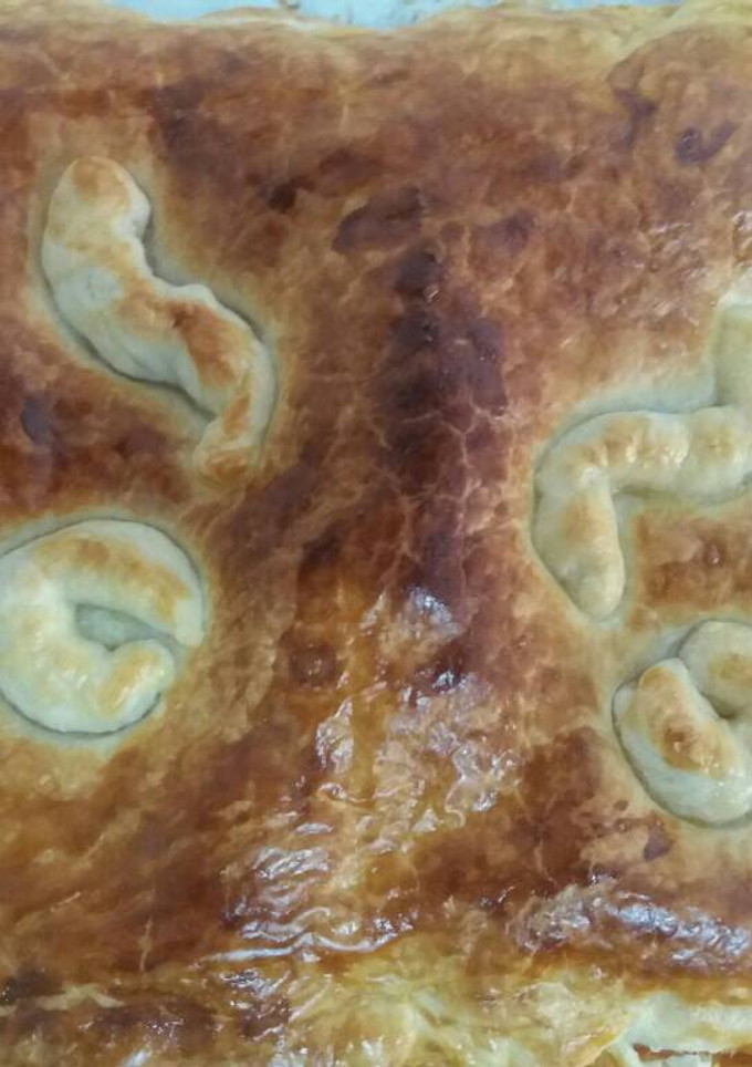 Una foto de Empanada de sobrasada, bacon y queso