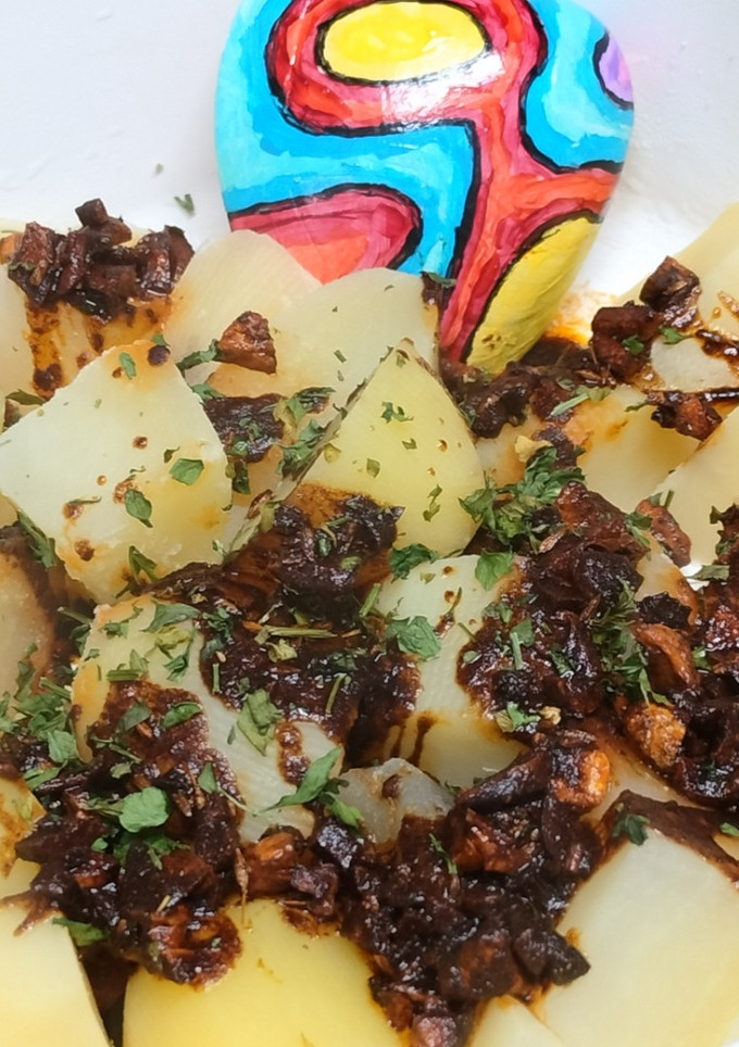 Una foto de Patatas al ajo con especias