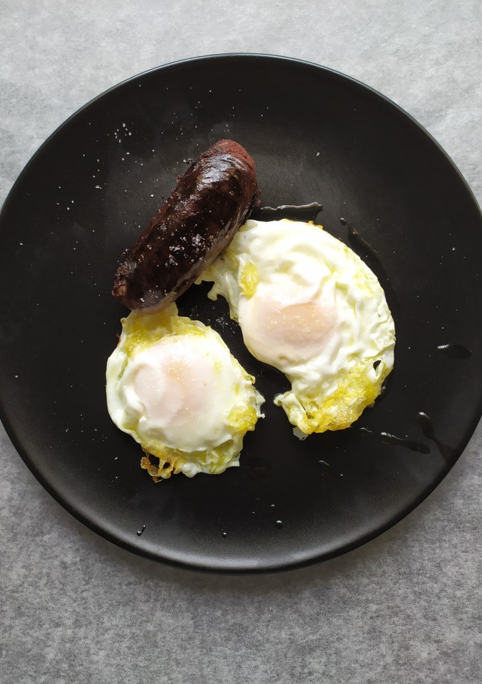 Una foto de Huevos fritos con morcilla