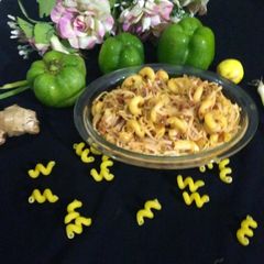 A picture of Chicken with vegitable pasta.