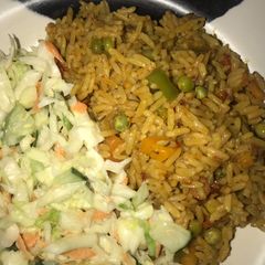 A picture of Fried Rice & coleslaw.