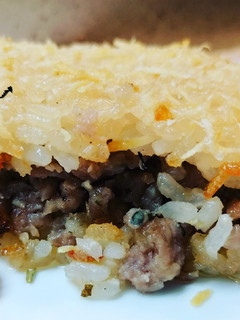 Una foto de Pastel de arroz con relleno de conejo