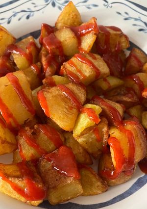 Una foto de Patatas con Salsa Sriracha !!!
