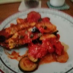 A picture of Baked aubegine in sauce.
