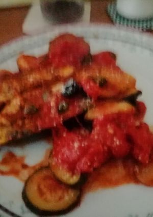 A picture of Baked aubegine in sauce.