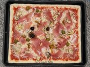 Una foto di pizza condimento
