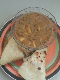A picture of Coconut green peas with potatoes.
