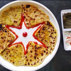 A picture of Potatoes and green peas paratha.