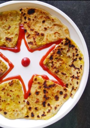 A picture of Potatoes and green peas paratha.