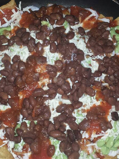 Una foto de Chilaquiles con frijoles