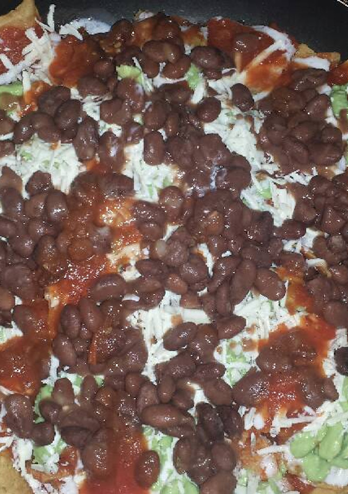Una foto de Chilaquiles con frijoles