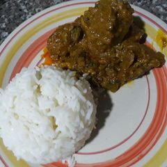 A picture of Boiled rice with ofe akwu.